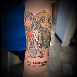 Zelda charaters in color on wrist